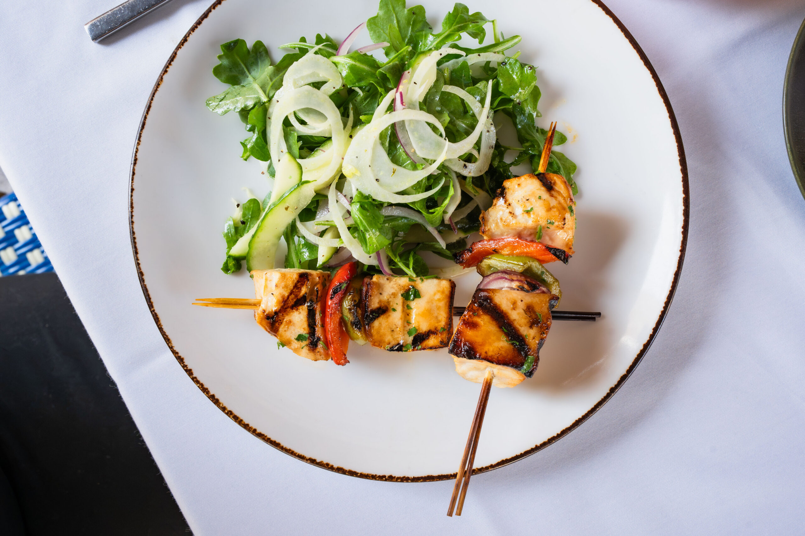 plate with lettuce and skewers